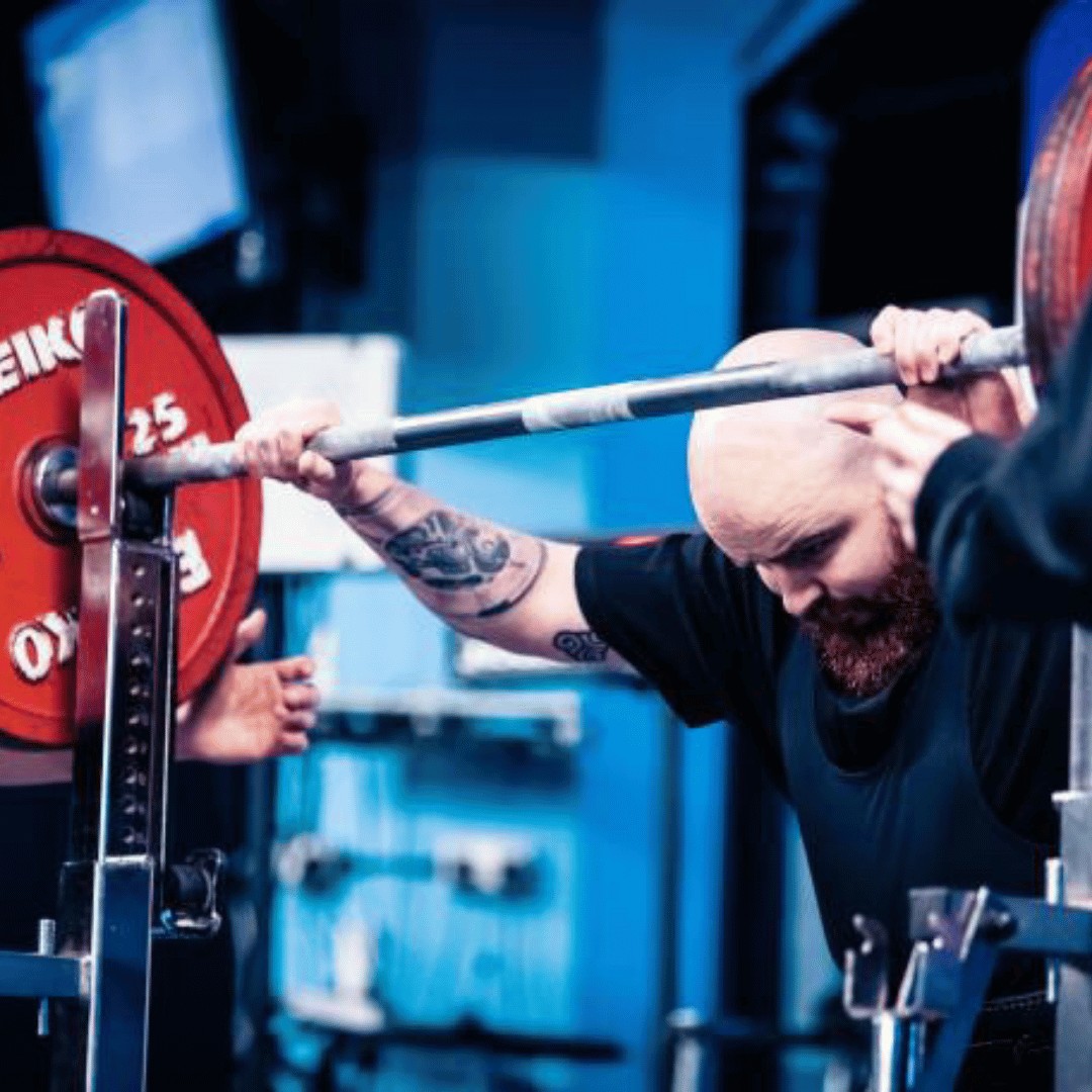 Image Scottish Powerlifter Setting Up For Squat At Competition And Sponsored Athlete of Outlaw Athlete Therapy
